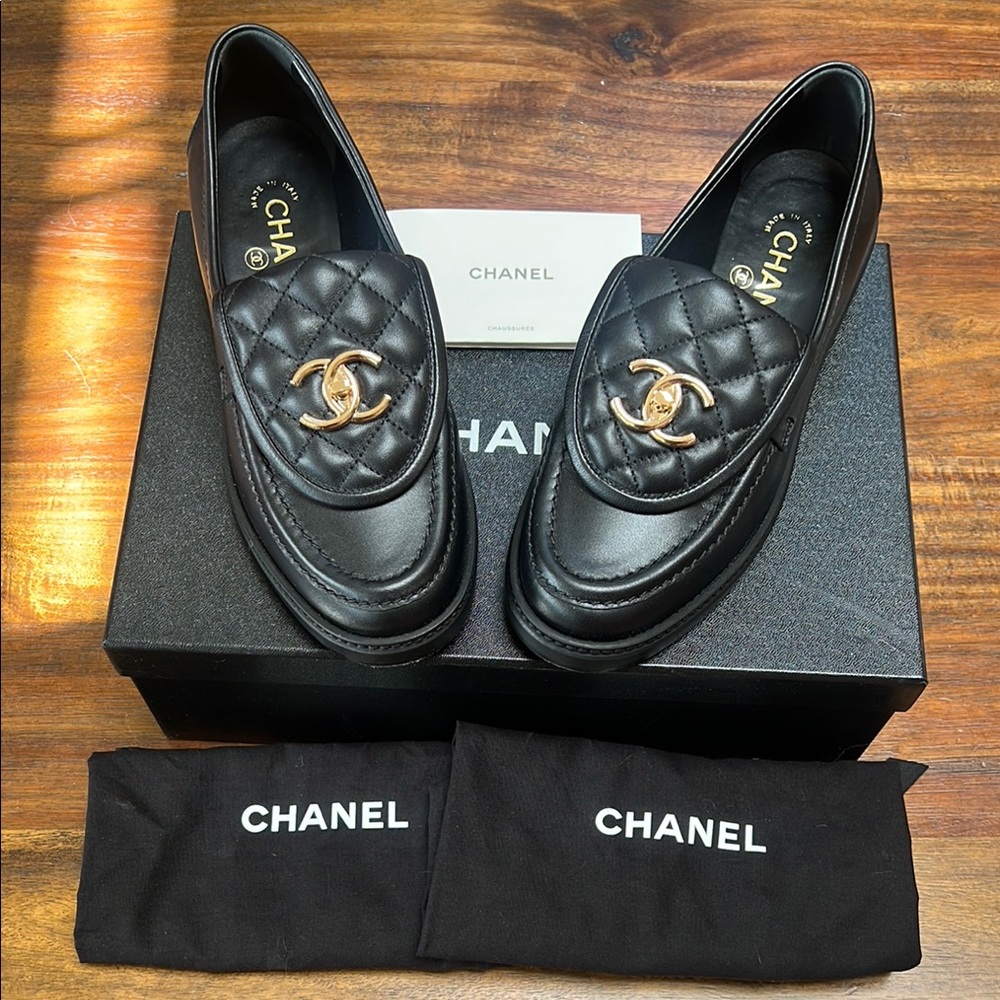 CHANEL Quilted Black Loafers with Gold Logo